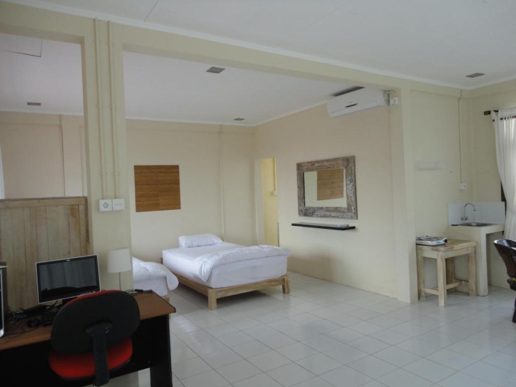 Urbanview Hotel Wayan Mansion Denpasar Rom bilde