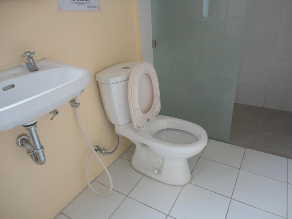 Urbanview Hotel Wayan Mansion Denpasar Rom bilde